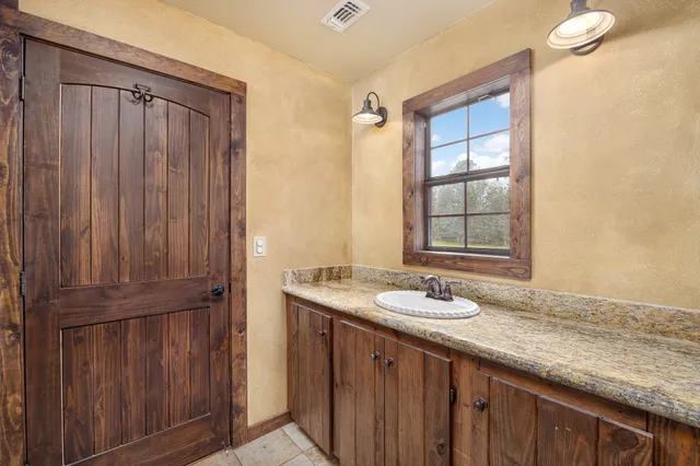 a bathroom with a shower and toilet