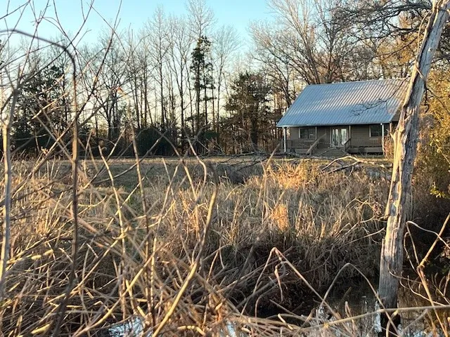 a view of road with with trees