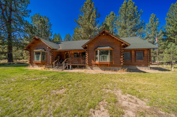 a front view of a house with swimming pool