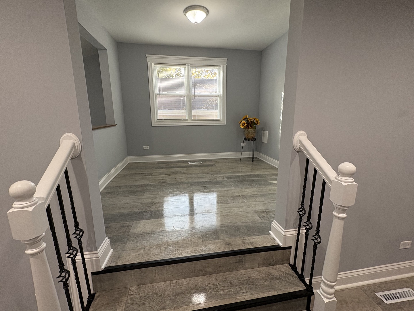 5517 Essex Road Lisle, IL 60532 - Photo 10 of 19 a view of an empty room with a window