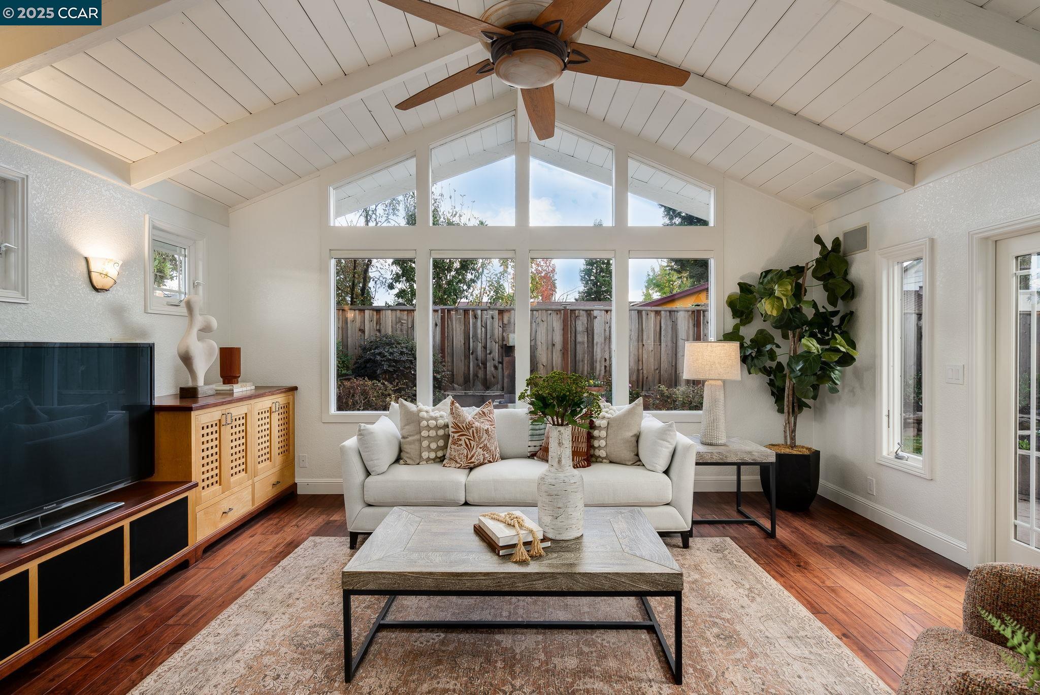 2828 Aptos Way San Ramon, CA 94583 - Photo 14 of 38 a living room with furniture a window and a fireplace