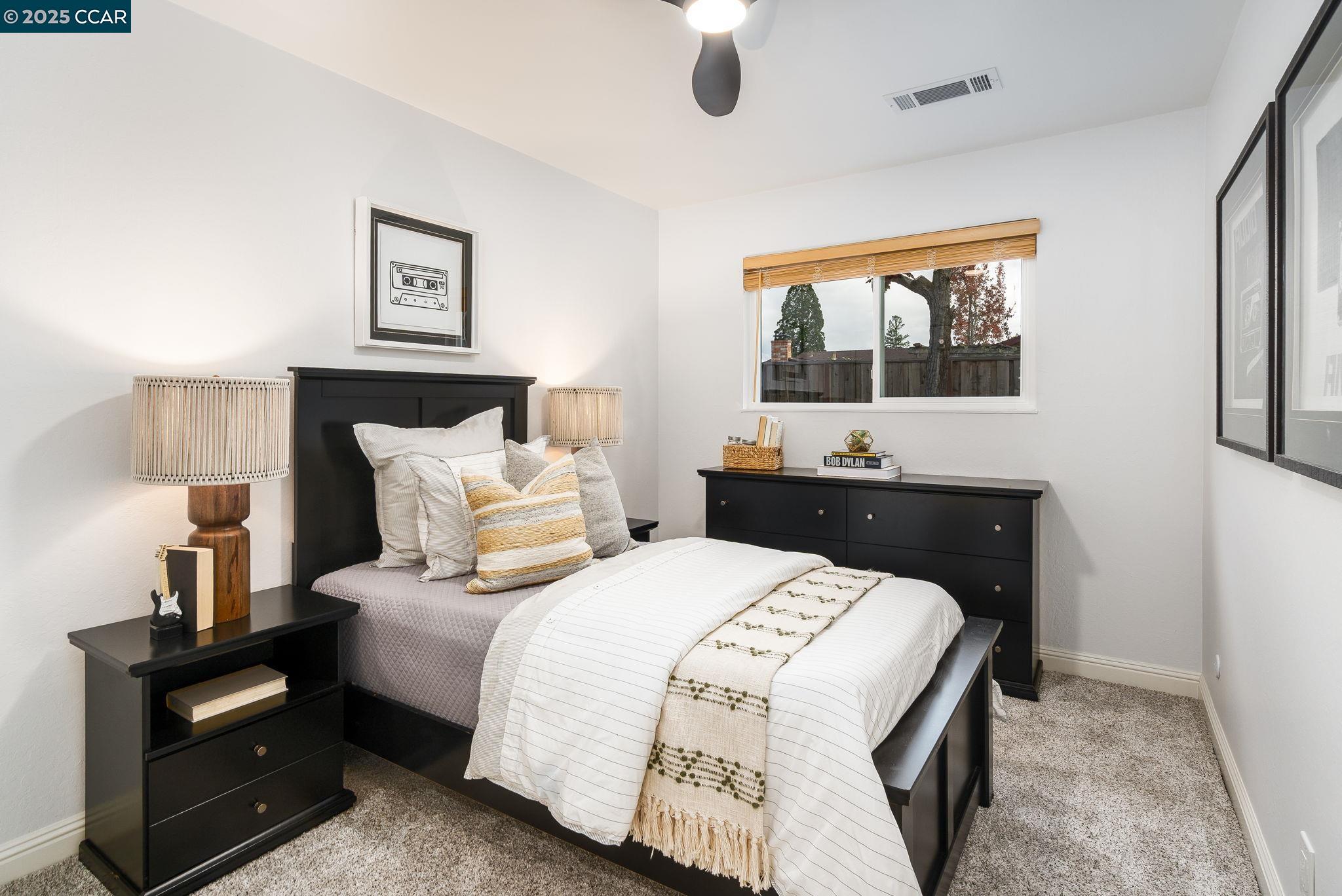 2828 Aptos Way San Ramon, CA 94583 - Photo 18 of 38 a bedroom with a bed and wooden floor