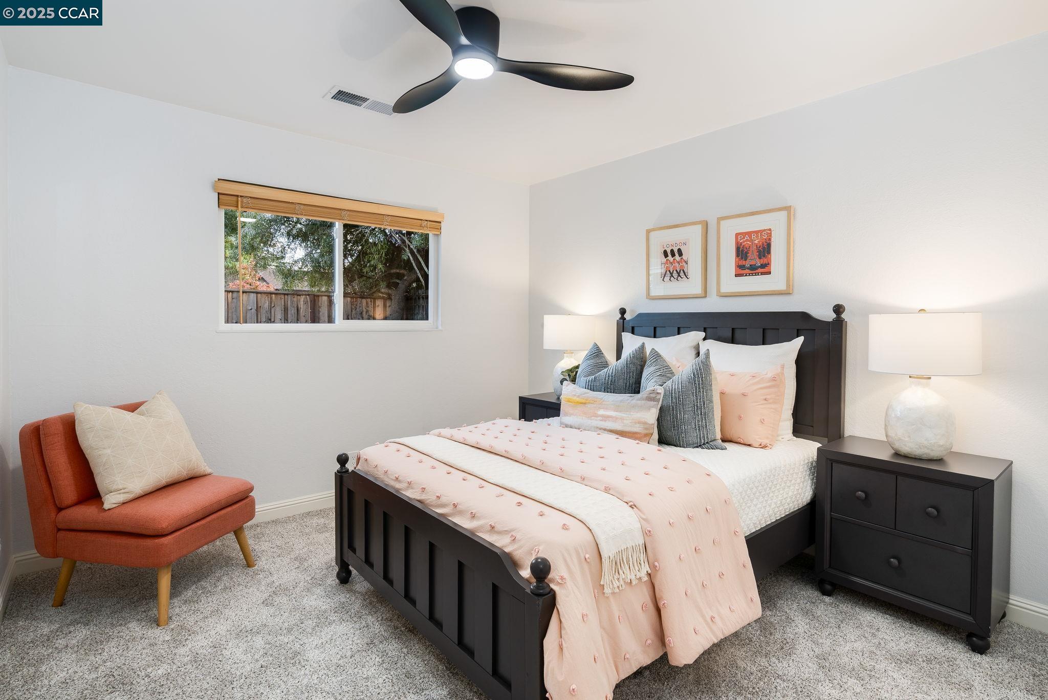 2828 Aptos Way San Ramon, CA 94583 - Photo 20 of 38 a bedroom with a bed and a couch