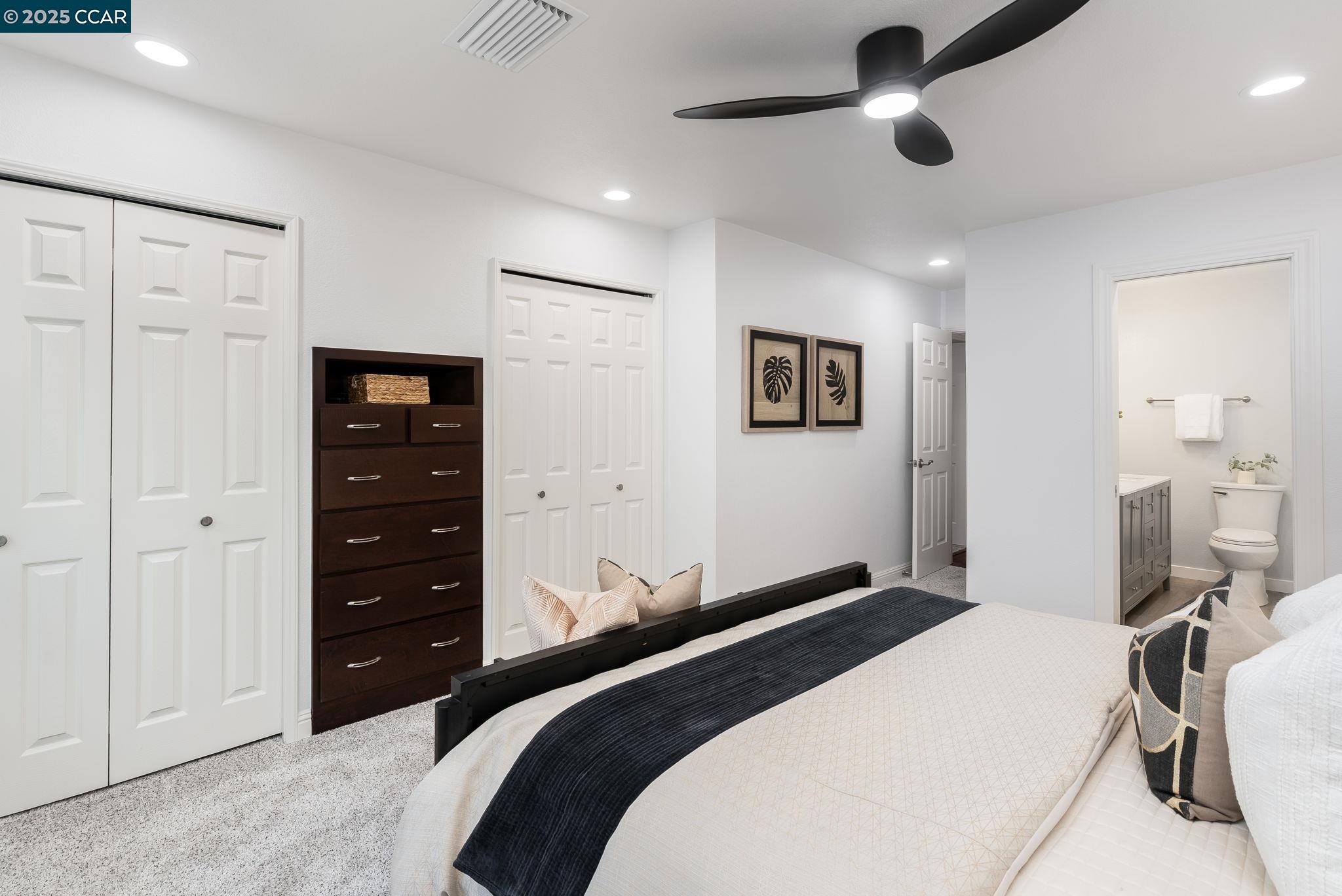 2828 Aptos Way San Ramon, CA 94583 - Photo 23 of 38 a bedroom with a bed and a dresser