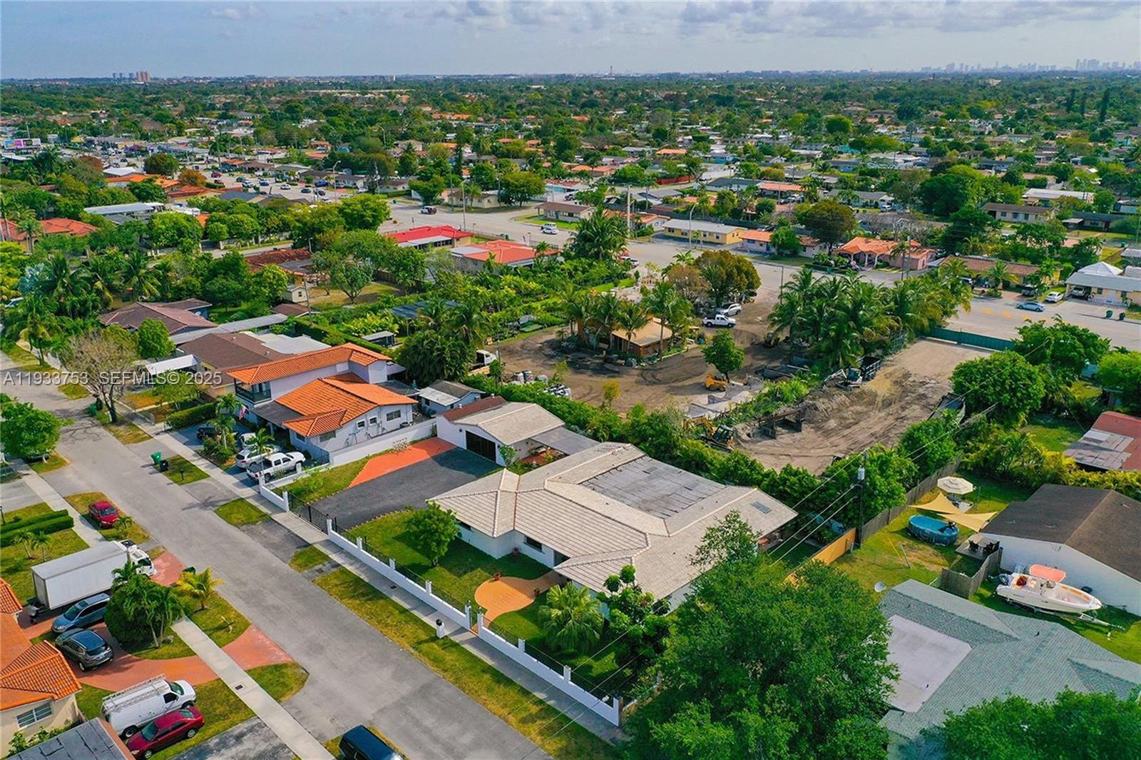 3585 Southwest 107th Court Miami, FL 33165 - Photo 7 of 45 an aerial view of residential houses with outdoor space and street view