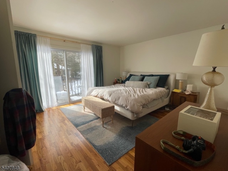 1 Carriage Way, Unit 8 Montclair, NJ 07042 - Photo 11 of 26 a living room with furniture and a window