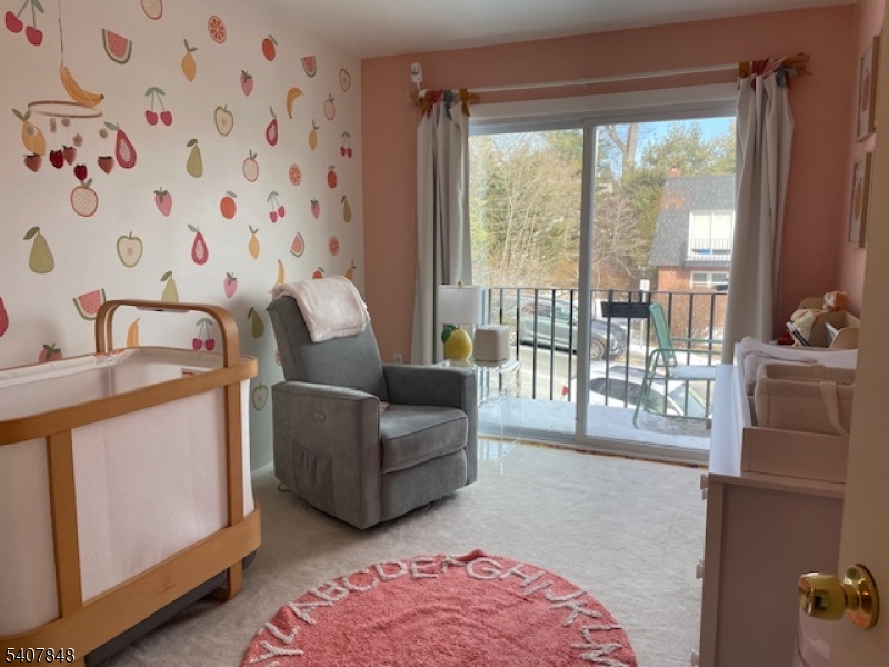 1 Carriage Way, Unit 8 Montclair, NJ 07042 - Photo 19 of 26 a living room with furniture and a floor to ceiling window