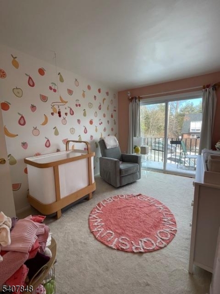 1 Carriage Way, Unit 8 Montclair, NJ 07042 - Photo 20 of 26 a living room with furniture and a floor to ceiling window