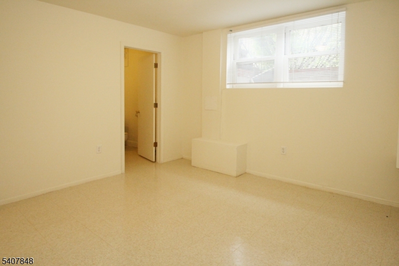 1 Carriage Way, Unit 8 Montclair, NJ 07042 - Photo 23 of 26 an empty room with windows