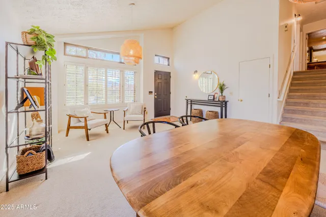 a bed room with a bed and a large mirror