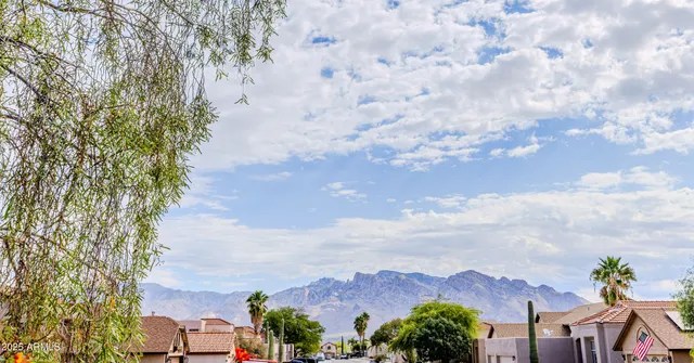 an aerial view of houses with yard