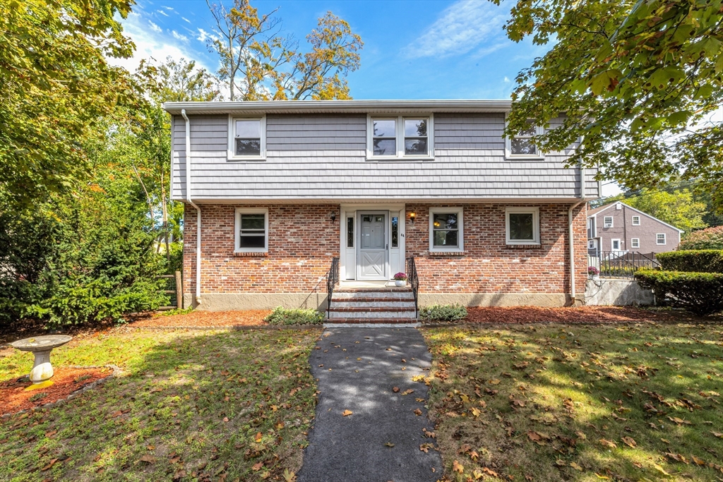 44 Milton Avenue Boston, MA 02136 - Photo 1 of 32 a front view of a house with garden