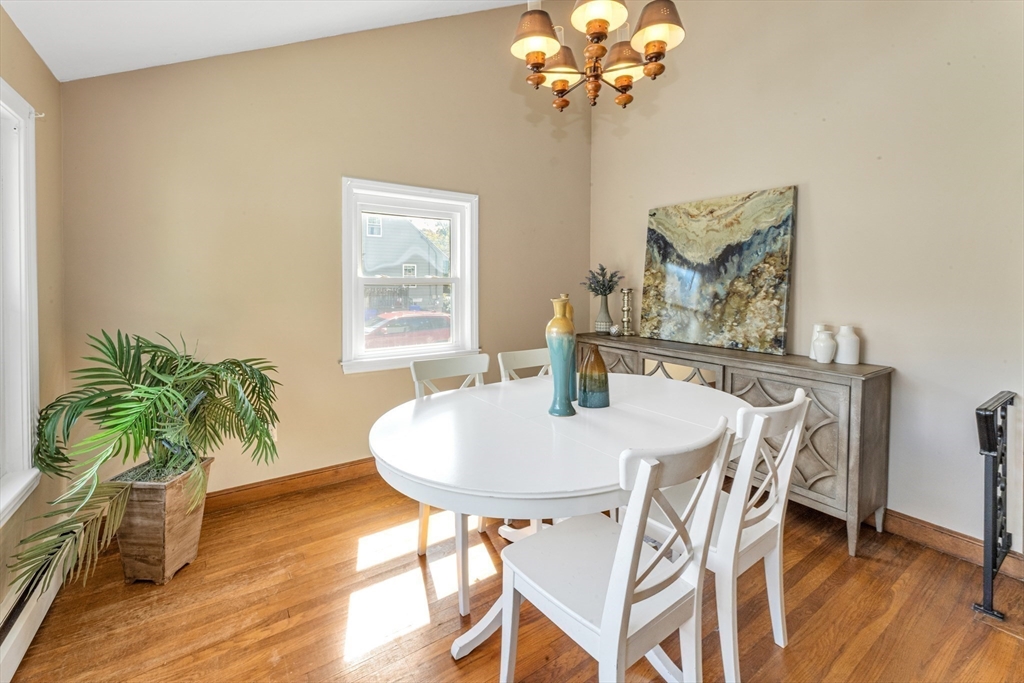 44 Milton Avenue Boston, MA 02136 - Photo 11 of 32 a view of a dining room with furniture and wooden floor