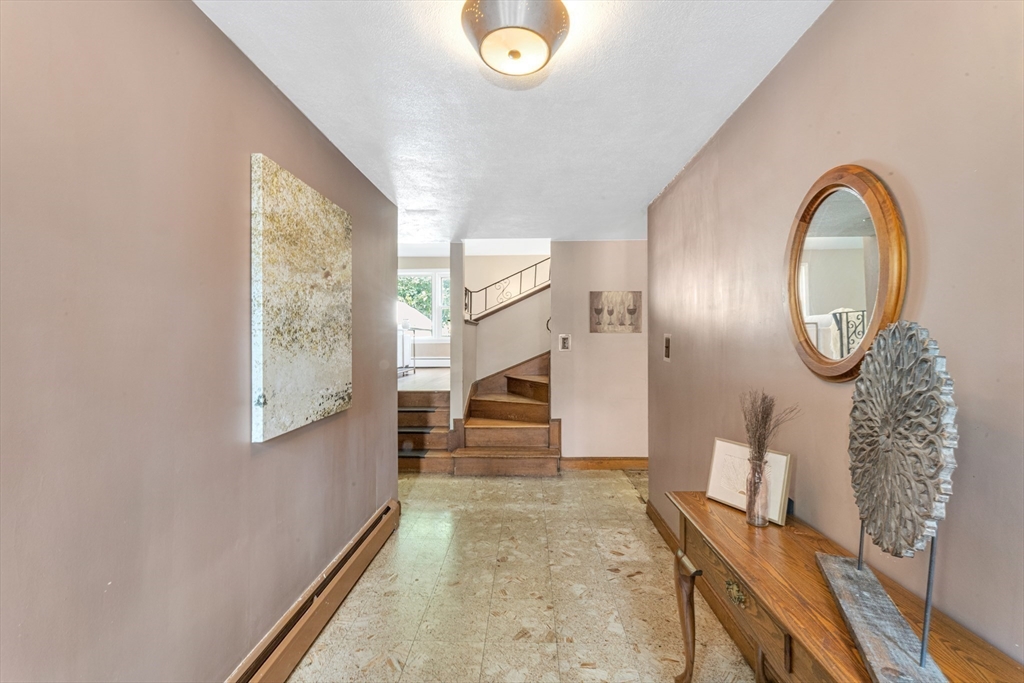 44 Milton Avenue Boston, MA 02136 - Photo 5 of 32 a view of a livingroom with furniture and staircase