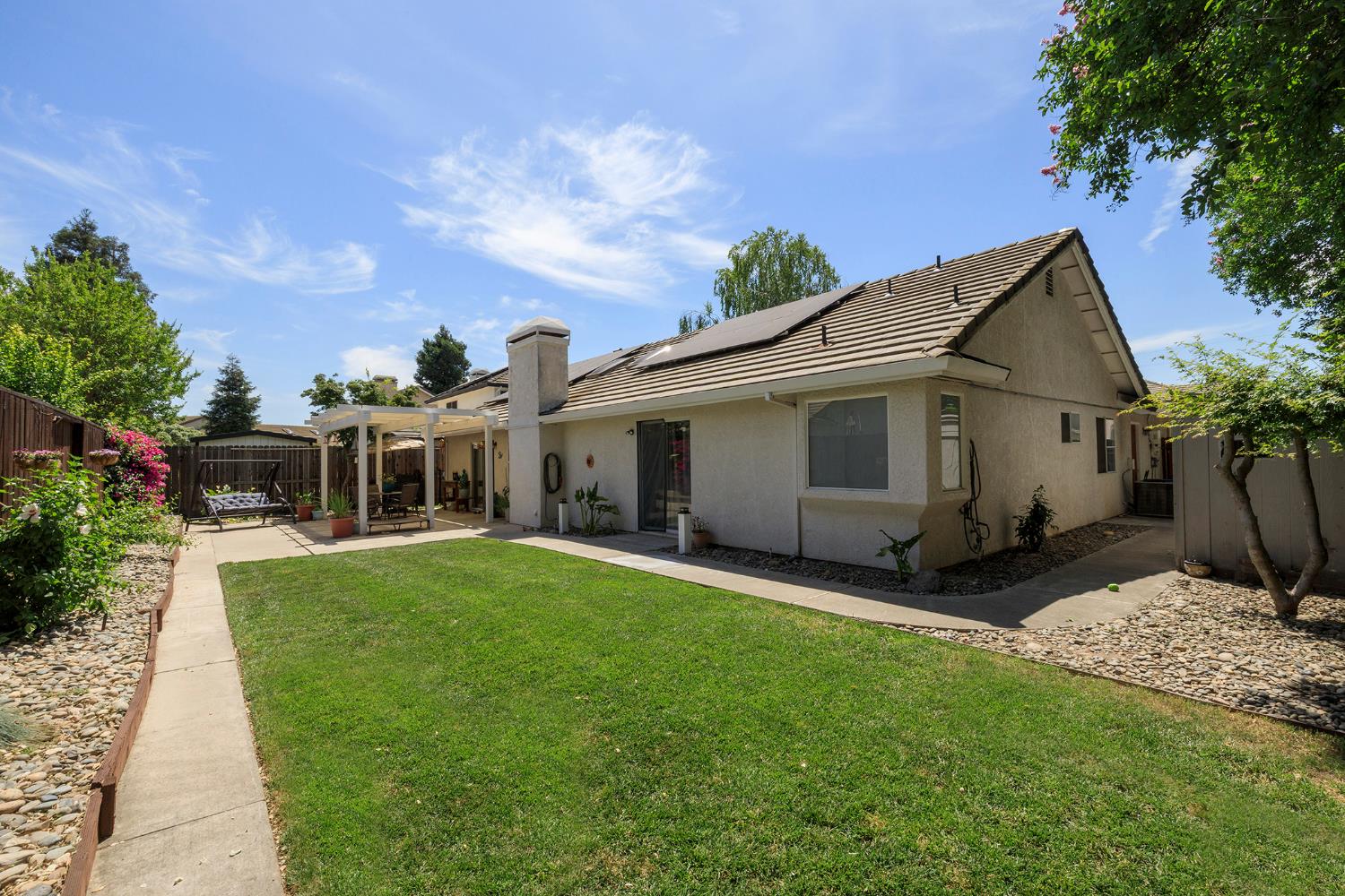230 Meyenberg Avenue Ripon, CA 95366 - Photo 52 of 52 a view of a house with backyard
