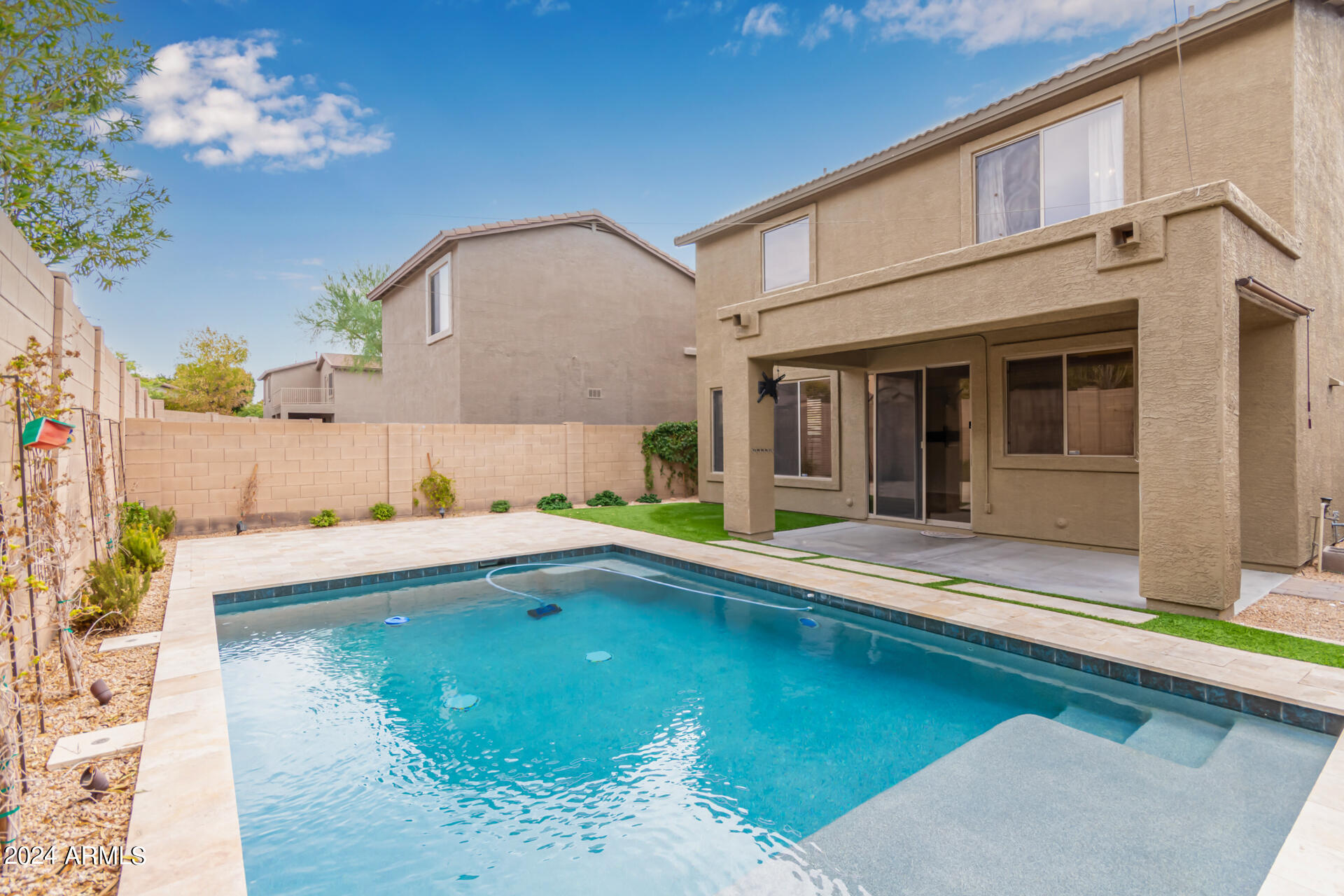 2626 West Florentine Road Phoenix, AZ 85086 - Photo 1 of 20 a view of a house with a swimming pool