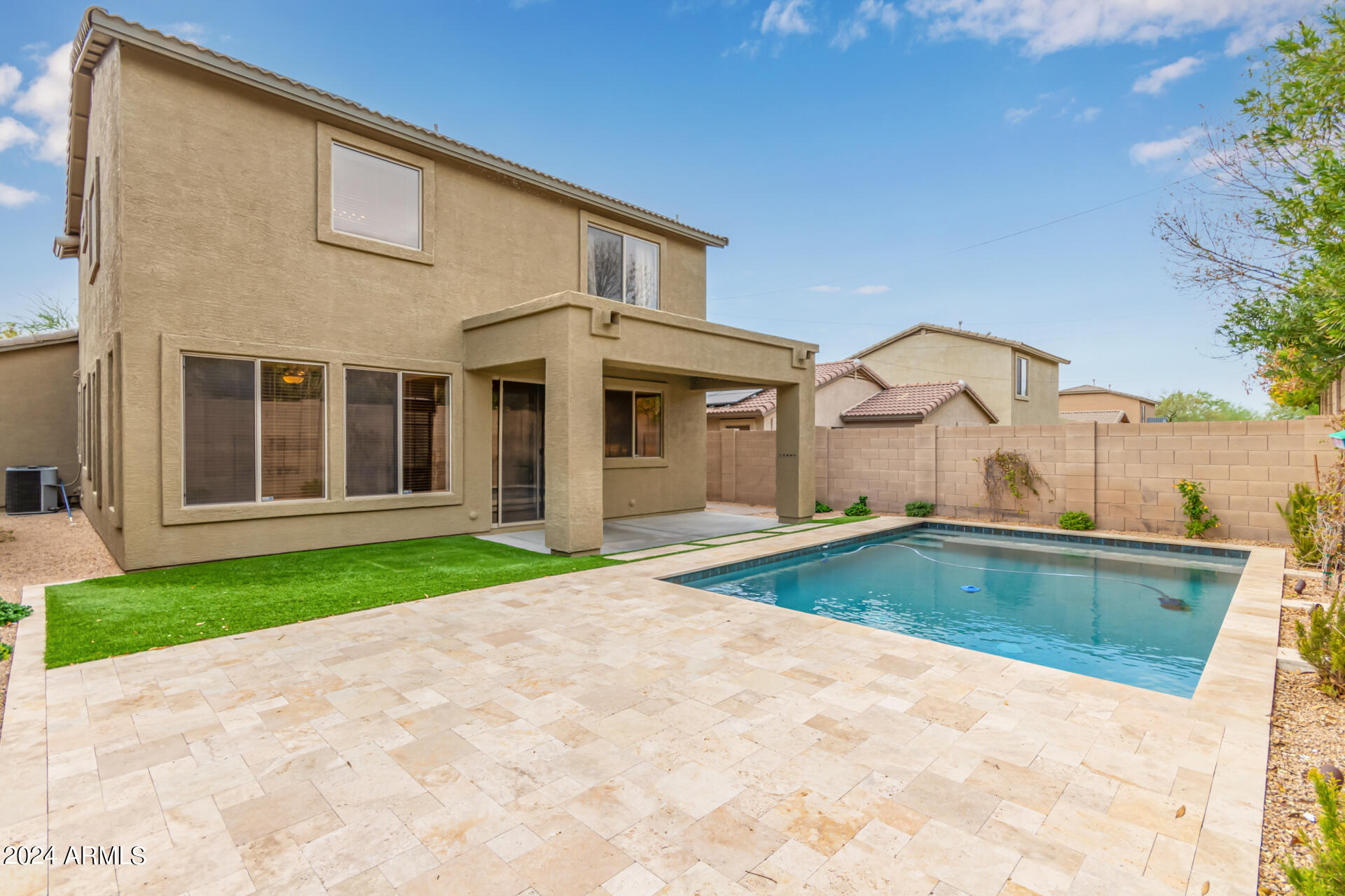 2626 West Florentine Road Phoenix, AZ 85086 - Photo 11 of 20 a view of a house with pool plants and large tree
