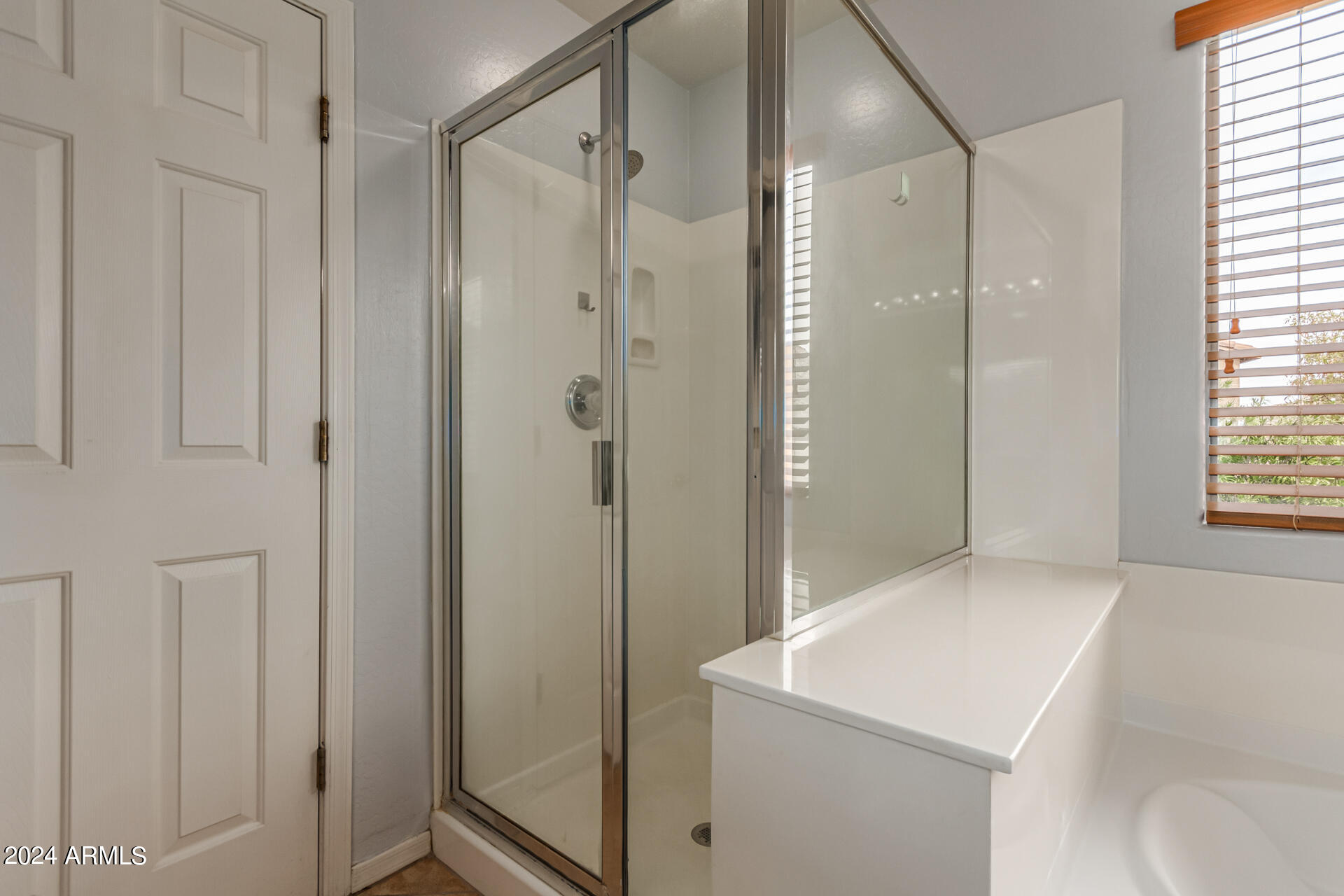 2626 West Florentine Road Phoenix, AZ 85086 - Photo 14 of 20 a bathroom with a sink and a mirror