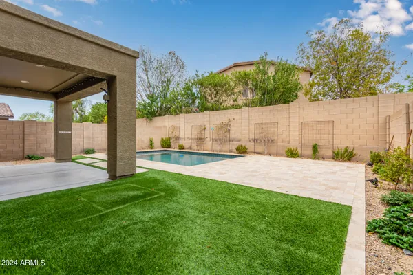 a view of a backyard with a garden