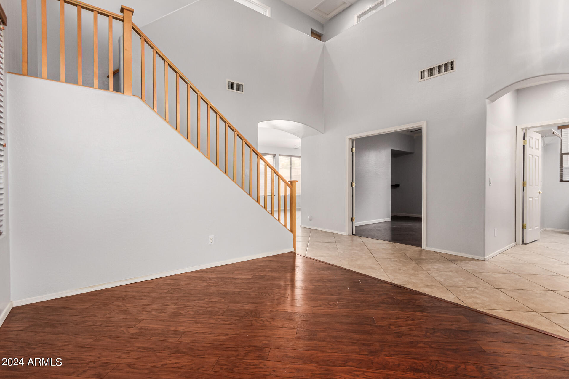 2626 West Florentine Road Phoenix, AZ 85086 - Photo 9 of 20 a view of an entryway with wooden floor