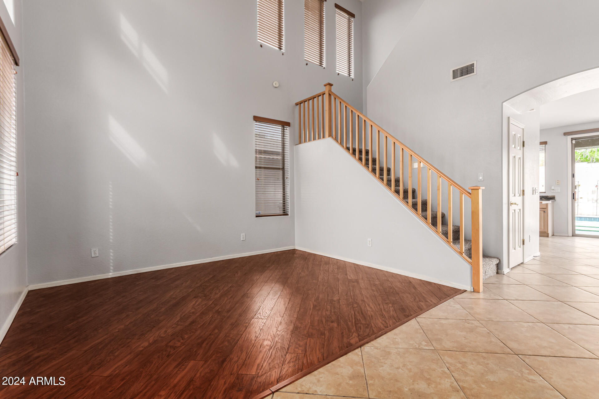 2626 West Florentine Road Phoenix, AZ 85086 - Photo 10 of 20 a view of entryway with wooden floor