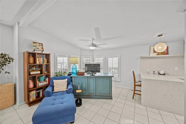 a kitchen with cabinets and furniture