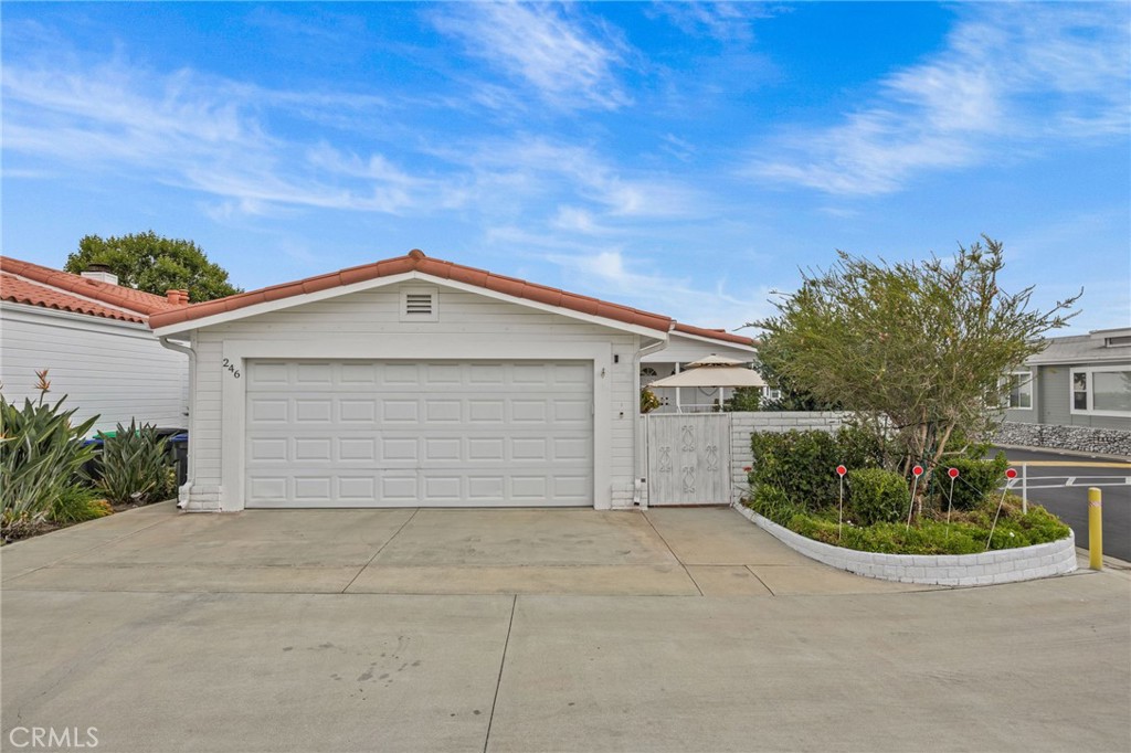 23301 Ridge Rte Drive, Unit 246 Laguna Hills, CA 92653 - Photo 25 of 35 a view of a house with a yard