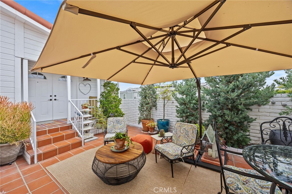 23301 Ridge Rte Drive, Unit 246 Laguna Hills, CA 92653 - Photo 3 of 35 a patio view with patio furniture