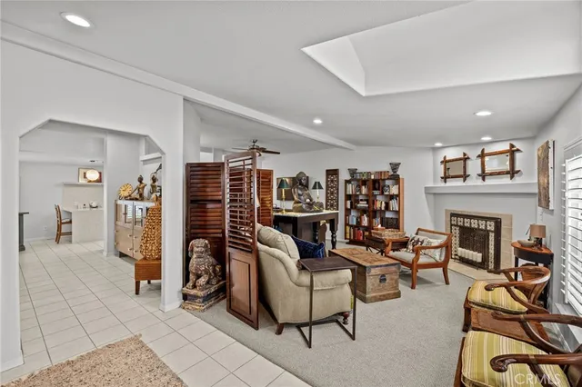 a view of a livingroom with furniture and a fireplace