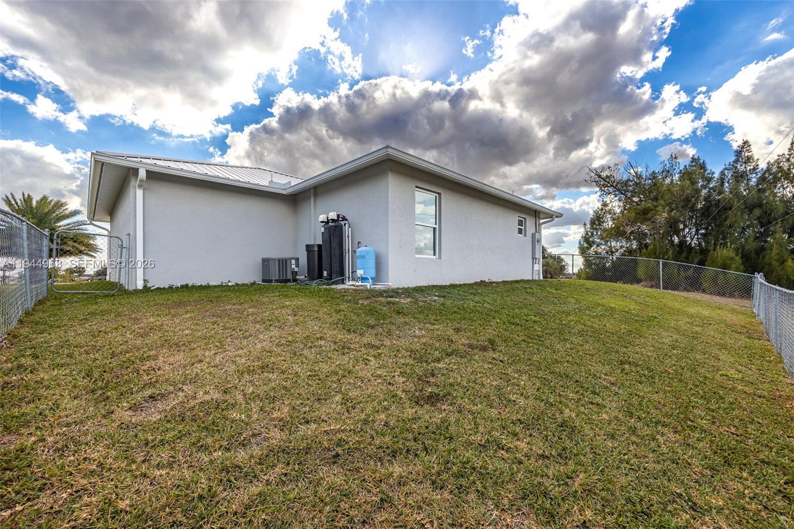1053 Lock Lane Moore Haven, FL 33471 - Photo 23 of 30 a house view with a garden space