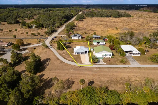 an aerial view of a house with a garden