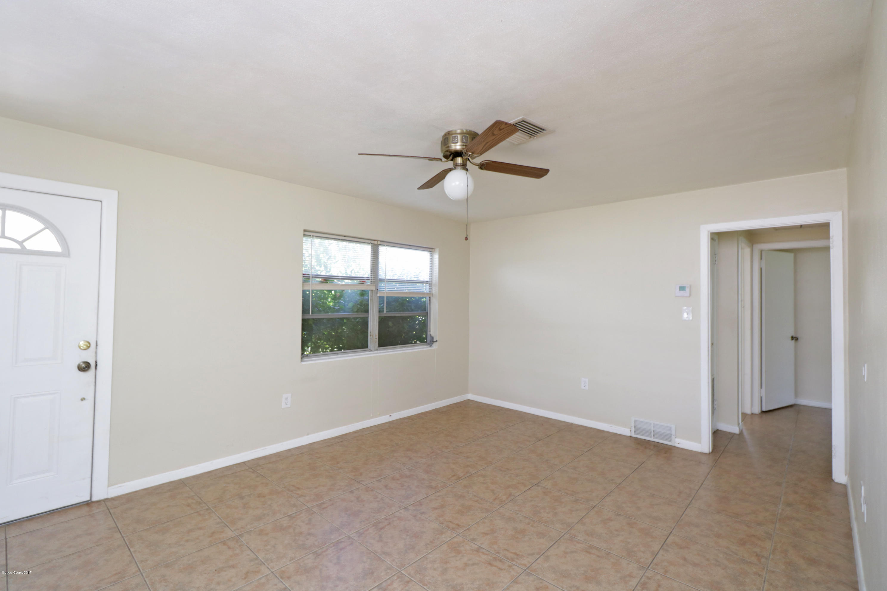 317 3rd Street Merritt Island, FL 32953 - Photo 2 of 26 Living Room