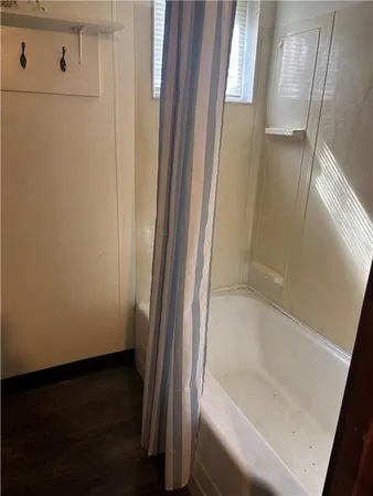 a close view of a bathtub in bathroom