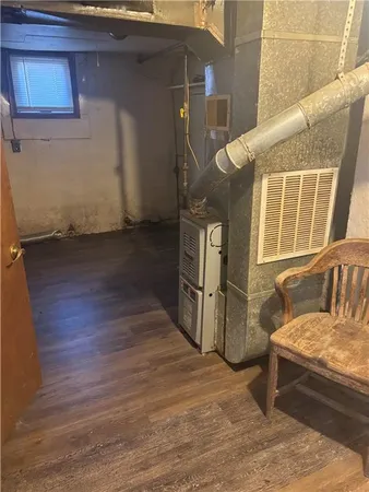 a view of a house with a wooden deck