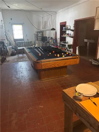 a room with furniture and a flat screen tv