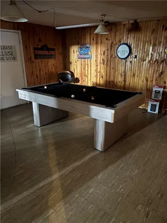 a view of a car park in front of a house