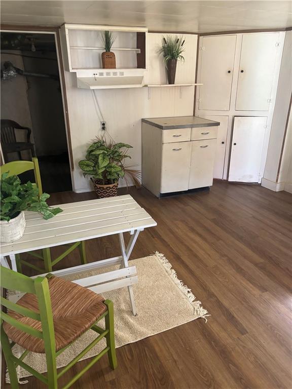 1762 Main Street Marianna, PA 15345 - Photo 8 of 29 a living room with wooden floor and potted plant