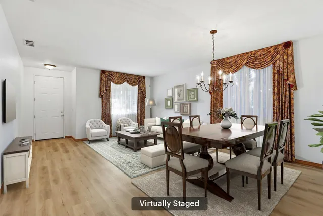 a view of a livingroom with furniture and window