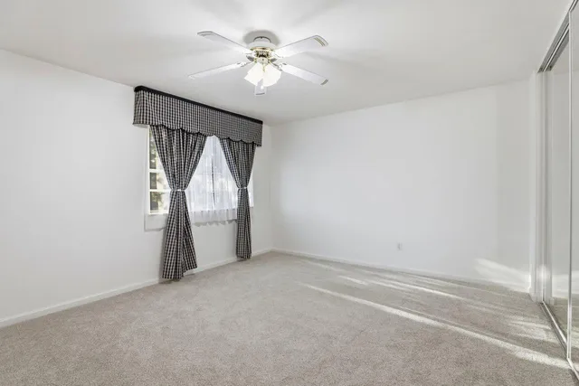 a bathroom with a double vanity sink toilet and shower
