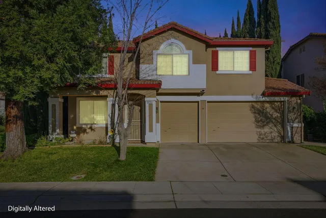 a view of a park with large trees