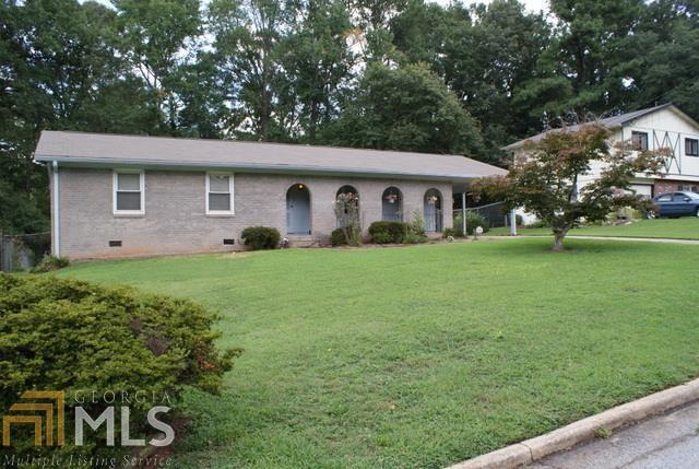 3966 Emerald N Drive, Unit 475 Decatur, GA 30035 - Photo 1 of 1 a front view of house with yard and green space