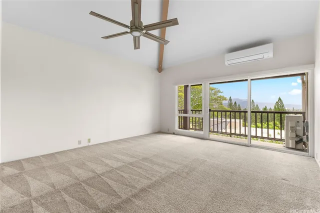 a view of a room with a large window