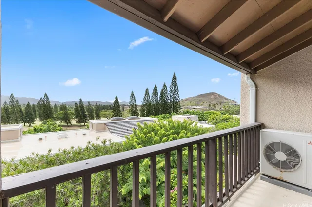 a view of a street view from a balcony