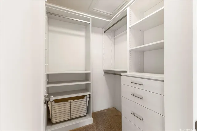 a view of an empty walk in closet
