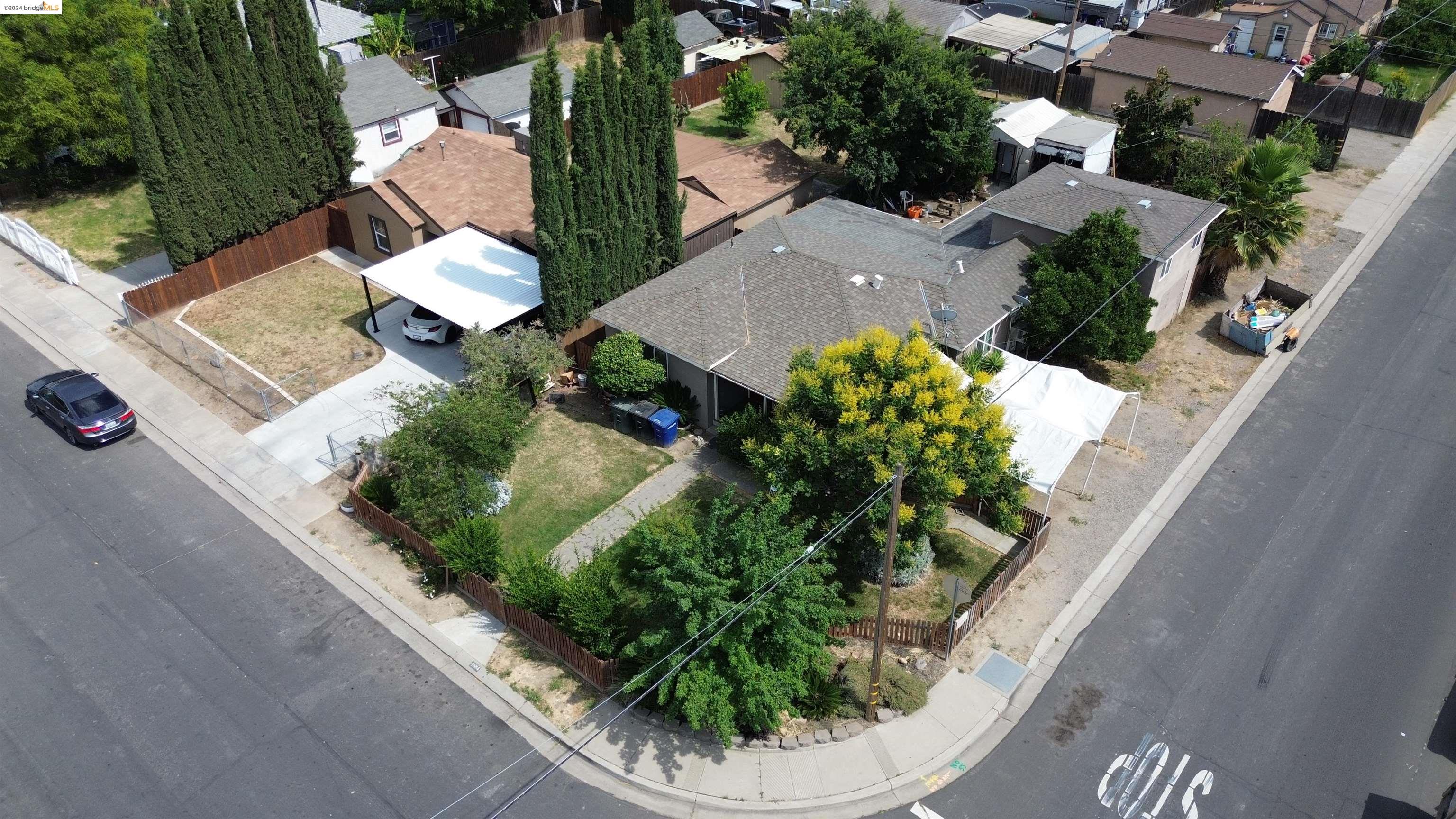 4884 Washington Street Salida, CA 95368 - Photo 1 of 1 an aerial view of a house with a garden