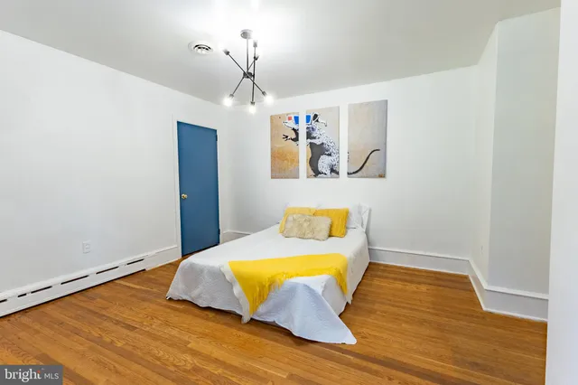 a view of a garden with lawn chairs