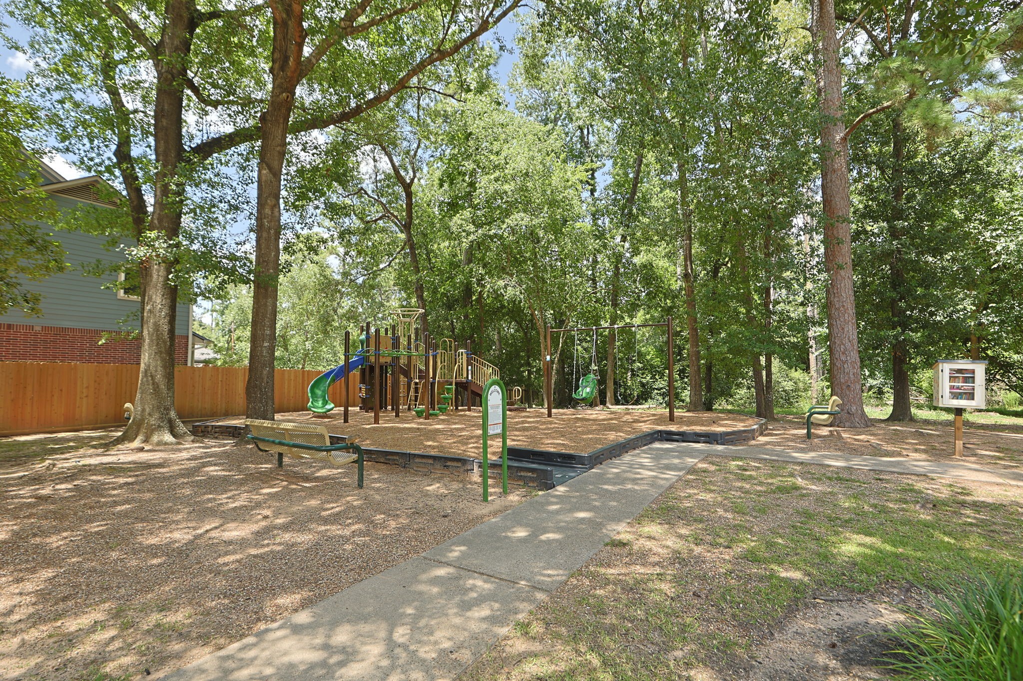 3414 Flaming Candle Drive Spring, TX 77388 - Photo 49 of 50 CANDLELIGHT HILLS - Neighborhood playground. A small book library is located in the park as well. The park has recently been refurbished with new playground equipment.