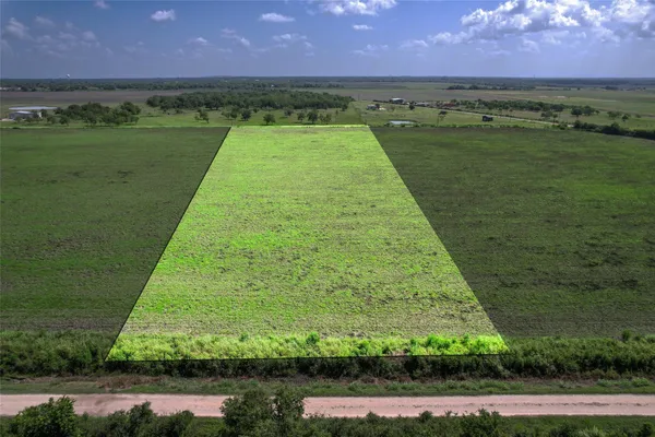 a view of a lake with a big yard