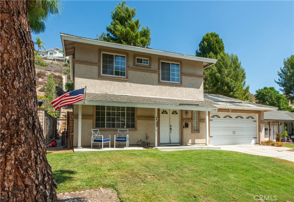 29262 Florabunda Road Canyon Country, CA 91387 - Photo 1 of 27 front view of a house with a yard