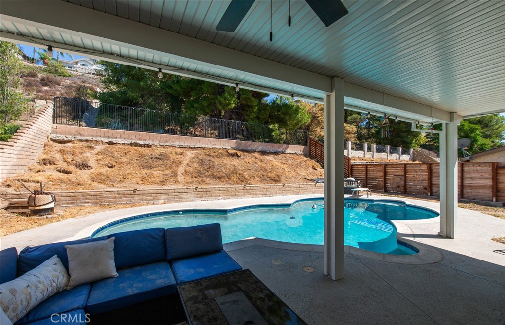 29262 Florabunda Road Canyon Country, CA 91387 - Photo 18 of 27 a view of a porch with furniture and garden